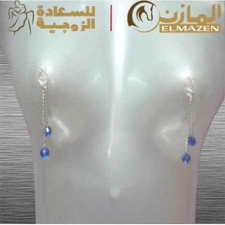 حلق حلمات الصدر بالكريستالة الزرقاء